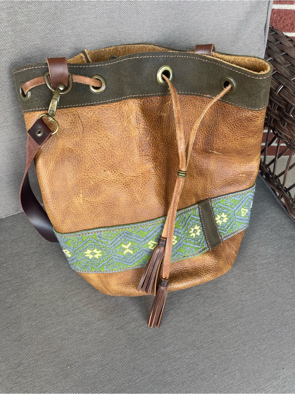Brown Leather Bucket Bag with Green Embroidered Accent